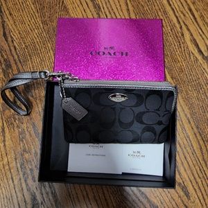 Coach black w silver wristlet with box